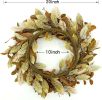 20-inch fall wreath adorned with brown magnolia leaves and small pomegranate berries, suitable for home, outdoor, farmhouse, porch, wall, and window